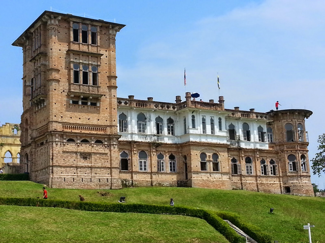 Kellie's Castle on the green hillside in Batu Gajah
